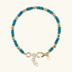 Bracciale con Rondelle in Pietra Naturale Turchese e Pepite Golden