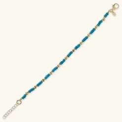 Bracciale con Rondelle in Pietra Naturale Turchese e Pepite Golden