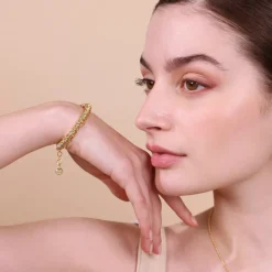 Bracciale con Rondelle Martellate e Sfere Lucide