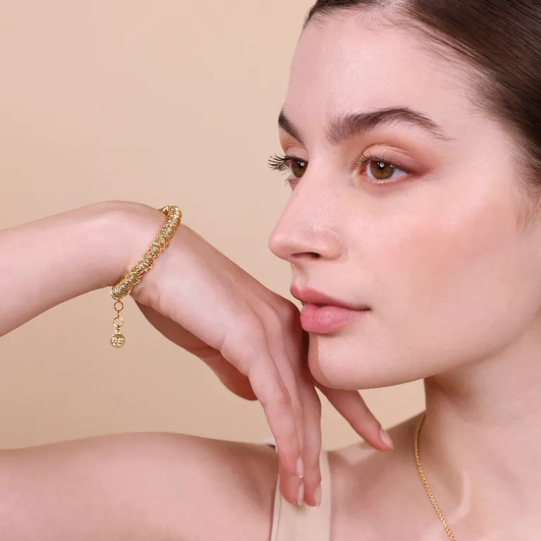 Bracciale con Rondelle Martellate e Sfere Lucide
