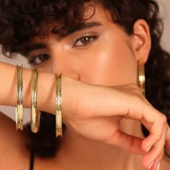 Set di Tre Bracciali Rigidi Concavi Martellati